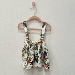 White Floral Daphne Pleated Suspender Skirt by Bailey’s Blossoms 9-12M